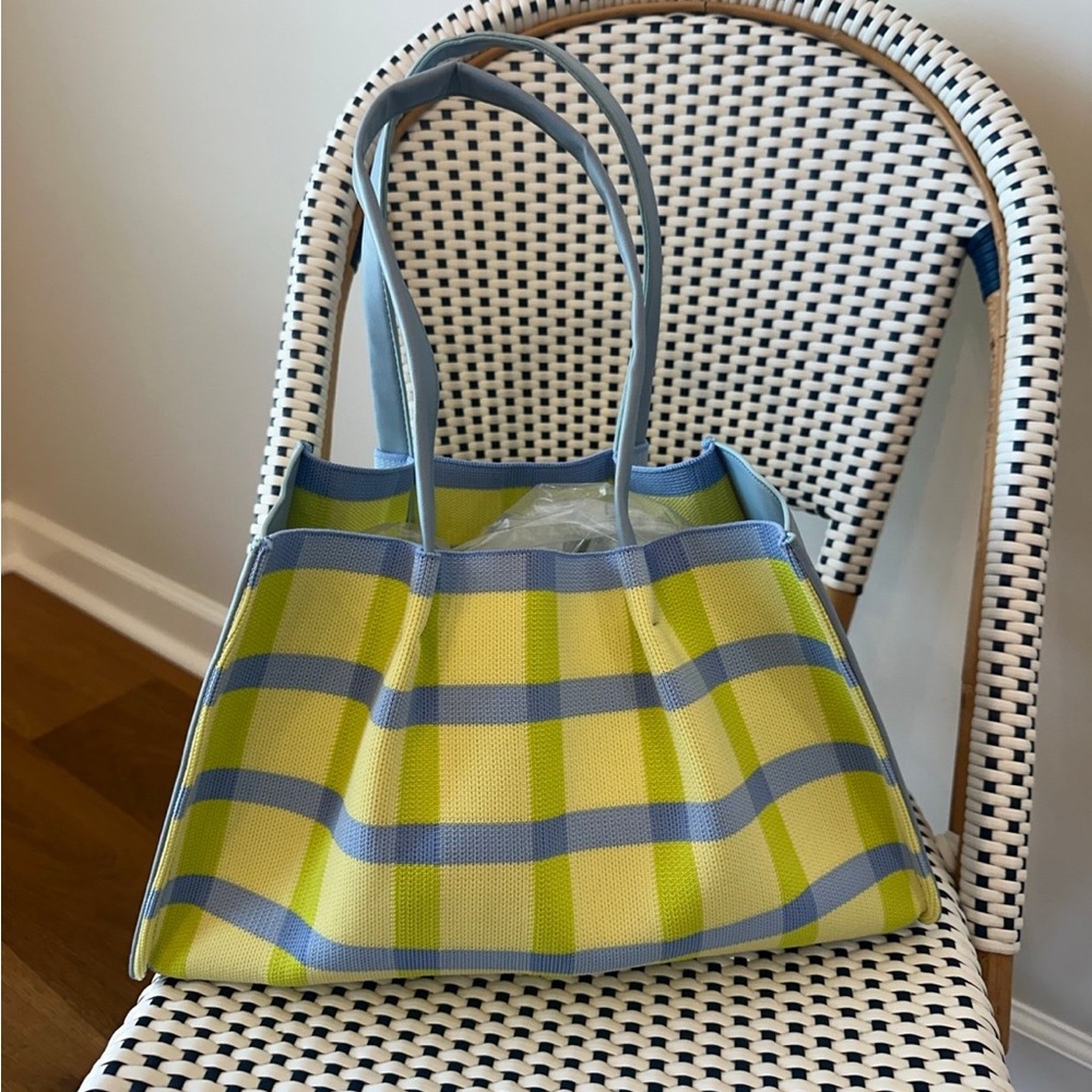 Neiman Marcus. New/ unused. Blue/yellow/green. Knit Bag